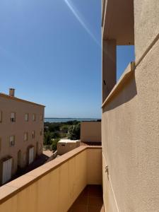a view from the balcony of a building at Espalmador E10, RT259PL in Es Pujols