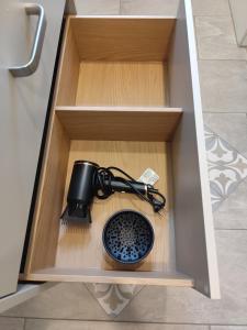 a camera in a drawer in a kitchen at Unterkunft-Uettingen in Uettingen