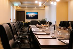 a large conference room with a long table and chairs at Santa Lucia Boutique Hotel in Santa Luċija +165 photos