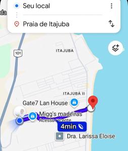 a screenshot of a cell phone with a map at Suíte Completa in Barra Velha