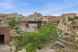 a view of a city with mountains and buildings at Babili Cappadocia Cave in Nevşehir