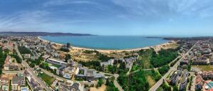 an aerial view of a city and a body of water at Hotel Longosa - All Inclusive Family Hotel near the beach in the peaceful southern part of Sunny Beach in Sunny Beach
