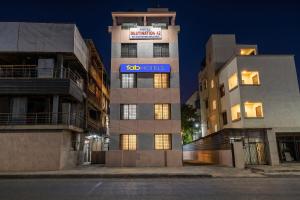 a building with a sign on the side of it at FabHotel Destination 42 - Nr Pheonix Mall in Kharadi