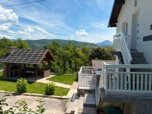 a house with a porch and a gazebo at Family Private House w Garden & Gazebo 10 Guests in Sarajevo