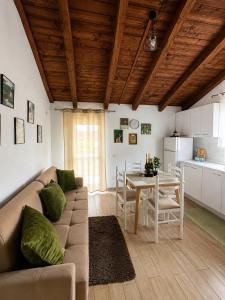 a living room with a couch and a table at Js House Shkoder 2 in Shkodër