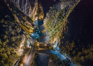 an aerial view of a road in a canyon at night at Khidikari Hotel in Ambrolauri