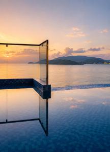 a swimming pool in the middle of a body of water at Prime New Hotel in Nha Trang