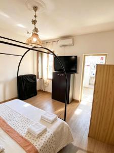 a bedroom with a bed in a room at the Lighthouse accommodation in Taranto
