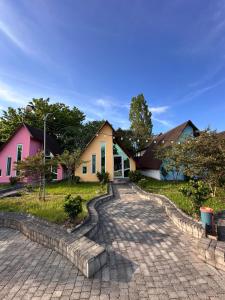 a cobblestone street in front of houses at Relax Beach Astara in Astara