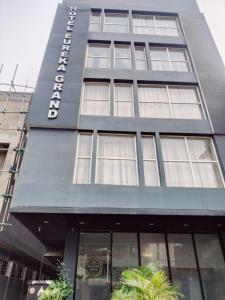 a building with a sign on the side of it at GH Brother Eureka in Guwahati