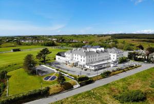 an aerial view of a large white building at Hydro Hotel in Lisdoonvarna