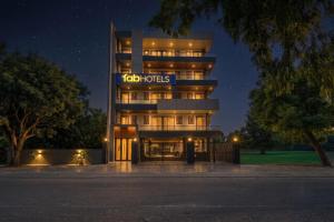 a building with a sign that reads joblords at FabHotel Durga Luxury Studio in Gurgaon