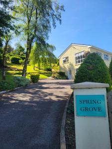 a sign that reads spring grove in front of a house at Spring Grove Guesthouse in Donegal