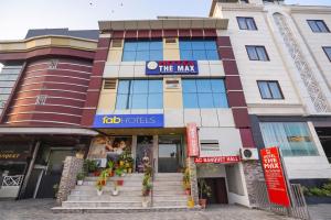 a building with a sign that reads the max at FabHotel The Max in Lucknow