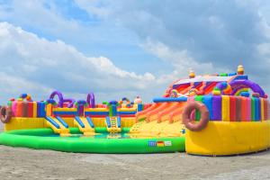 a large inflatable play structure on the beach at Mera Resort in Venus