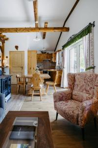 a living room with a couch and a table at Ferienhaus Weiss in Oberschützen