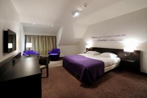 Postel nebo postele na pokoji v ubytování Van der Valk Hotel Hilversum/ De Witte Bergen