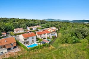 an aerial view of a house with a swimming pool at Villa LanaB - Private Pool - by Istrabook in VeliGolji