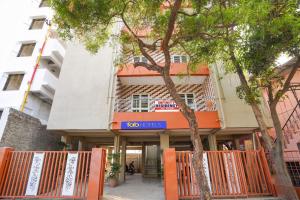 a building with a sign that reads go cities at FabHotel Infinity Residency in Pune