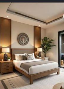 a bedroom with a large bed and two lamps at Sheena Apartment in Manila