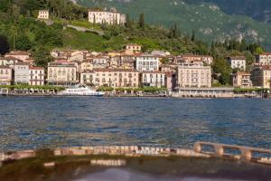 a town on the shore of a body of water at Palazzo Genazzini in Bellagio +30 photos