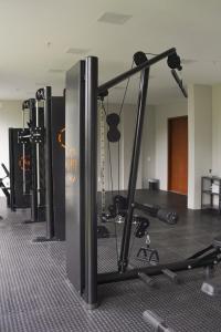 a room with a gym with tread machines at Hotel Rexton in Barra Mansa