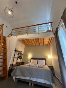 a bedroom with a bed with a loft at Privileged villa in Nea Peramos +71 photos