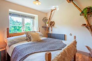 a bedroom with a bed and a window at 1 Bed in Bream oc-m43316 in Bream
