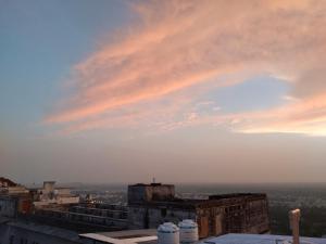 a view of the city from the roof of a building at Mahadev Bhavan in Chittaurgarh +16 photos