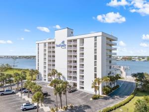 an aerial view of the resort with a parking lot at SeaSpray Riverside 112 in Perdido Key