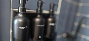 a group of bottles of wine in a rack at Hibiscus Suite - Private Studio Apartment in Rhinebeck Village in Rhinebeck