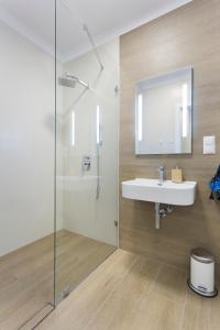 Ένα μπάνιο στο Spokojny i komfortowy apartament wśród zieleni