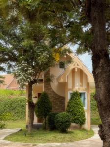 a house with two trees in front of it at silverpine khao kho in Phetchabun