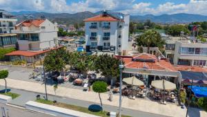 an overhead view of a city with tables and umbrellas at Mia Casa Hotel in Fethiye