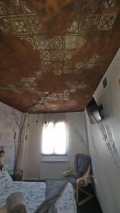 a room with a ceiling with a window and a bed at Paraíso Desconocido 1. Pura Magia in Cardaño de Abajo +25 photos