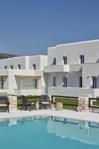a view of a house with a swimming pool at Pounda Resort Paros, a member of Radisson Individuals in Pounda