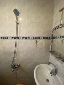 a bathroom with a shower and a sink at Bedro Private Garden Studio & Outdoor Lounge 1 Min to Sea in Dahab