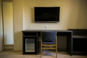 TV a/nebo společenská místnost v ubytování Hotel Nacional + 13 fotografií