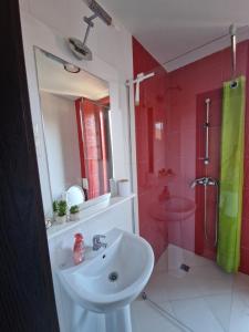a bathroom with a sink and a shower at INFINITY VIEW 8 Lozenets in Lozenets +10 photos