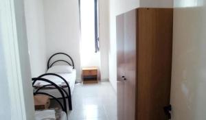 a room with two bunk beds and a hallway at Vieste Residence Gallo Con Piscina in Vieste
