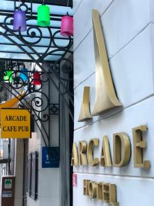 a sign for an aced sign on the side of a building at Arcade Hotel & SPA Nisantasi in Istanbul