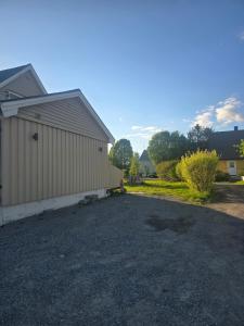 a driveway in front of a building at Airport Central Apartment in Alta