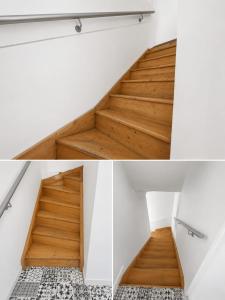 a staircase in a house with wooden floors and white walls at Chateau Compiegne Houses - Centre Ville in Compiègne