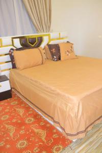 a bedroom with two twin beds in a room at kaf halal guest house in Addis Ababa