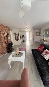 a living room with a couch and a coffee table at Edificio Genesis in Rodadero +9 photos