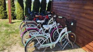 a group of bikes parked next to a fence at Flota in Ostrowo