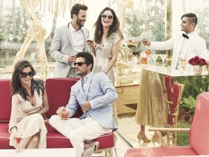 a group of people sitting around a table at Faena Miami Beach in Miami Beach +245 photos