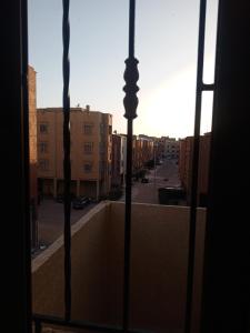 a view from a window of a city with buildings at Riad Bollywood Spacious 5 Beds Stay in Benguerir
