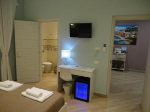 Postel nebo postele na pokoji v ubytování Guest House Le Tre Spezie