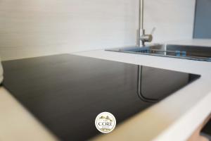 a close up of a counter with a sink at The Core Lezhe in Lezhë